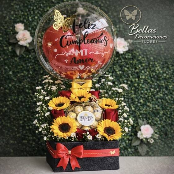 Arreglo de girasoles y chocolates